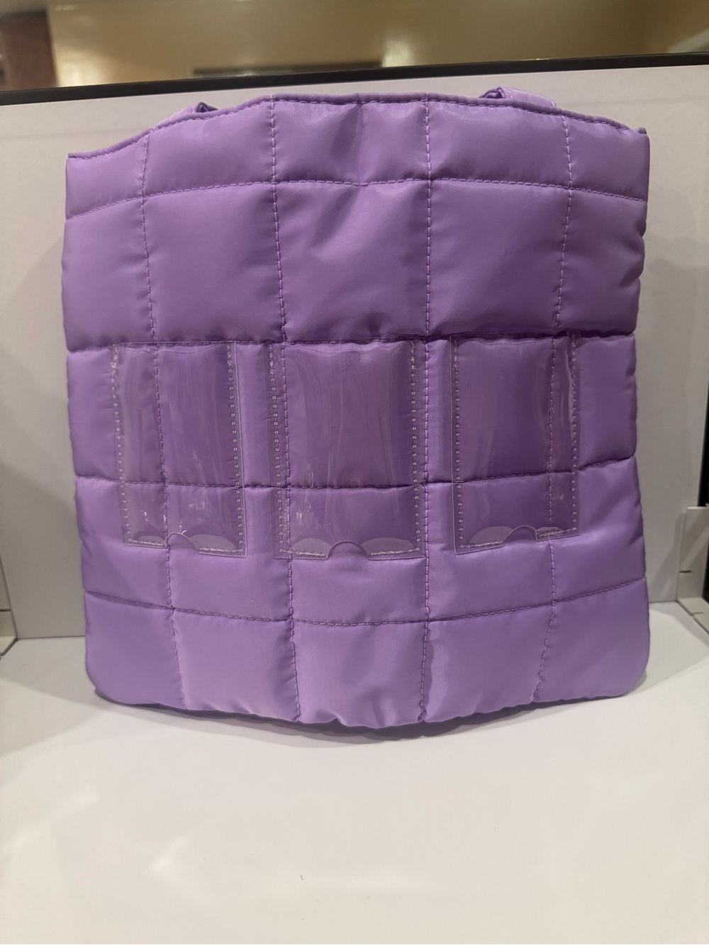 Lilac Quilted Puffer Tote holds instax Polaroids